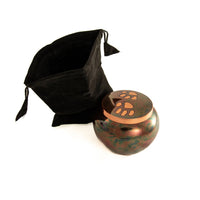 Urn odyssey copper Raku two paw prints